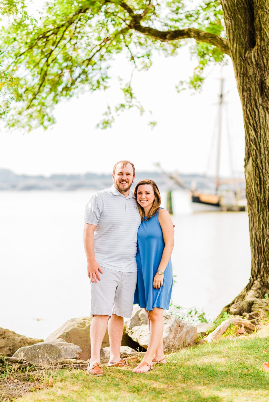 couple posing at the waterfront in Founders Park in Old Town Alexandria