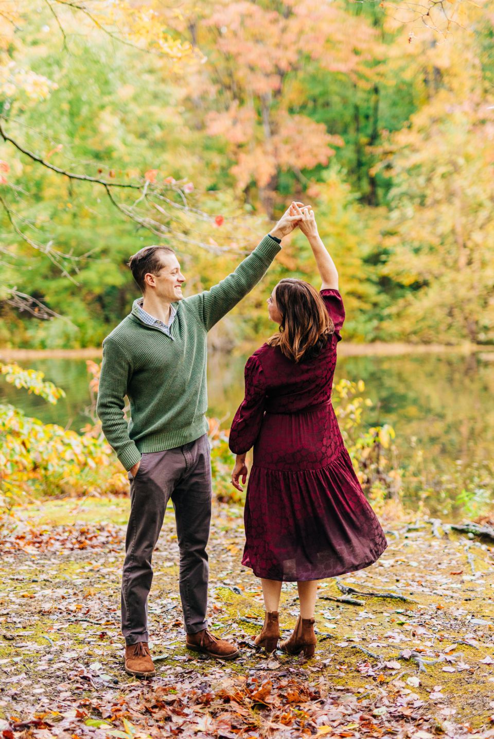 Young couple posing for photos at Burke Lake in Springfield, VA