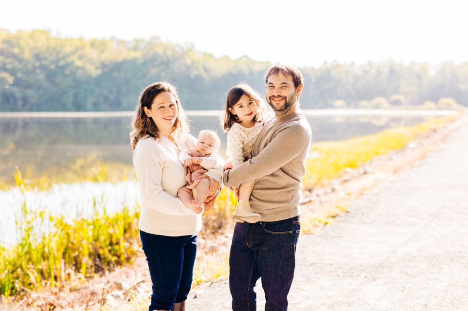Family posing for photos at Burke Lake in Northern VA
