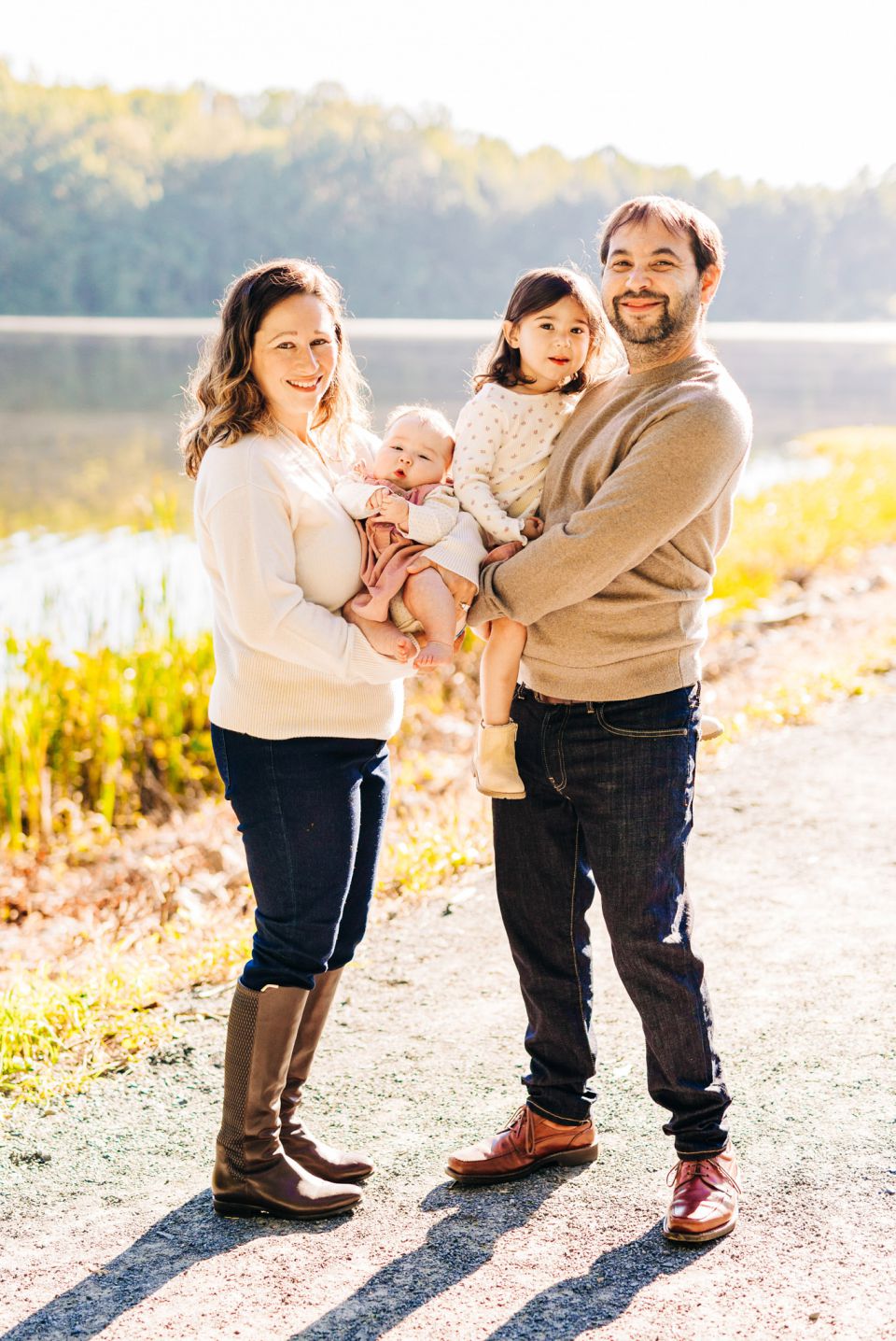 Family posing for photos at Burke Lake in Northern Virginia