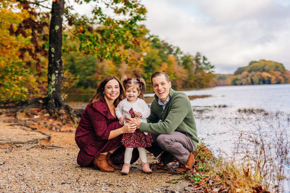 Young family posing for photos at Burke Lake in Springfield, VA