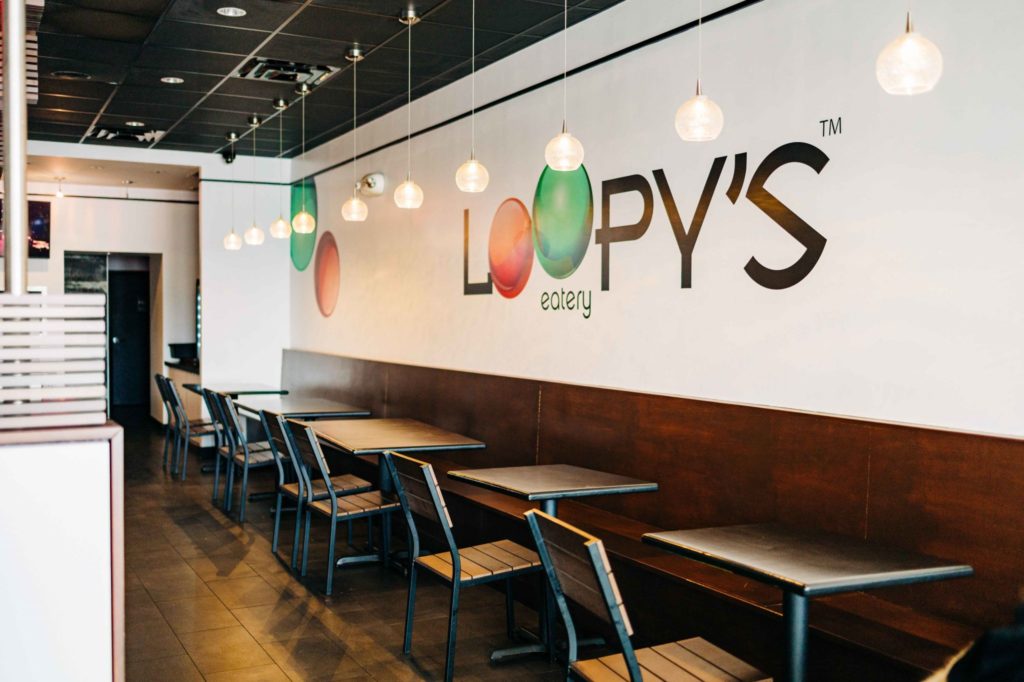 Seating area and decor at Loopy's Eatery in Annandale, VA