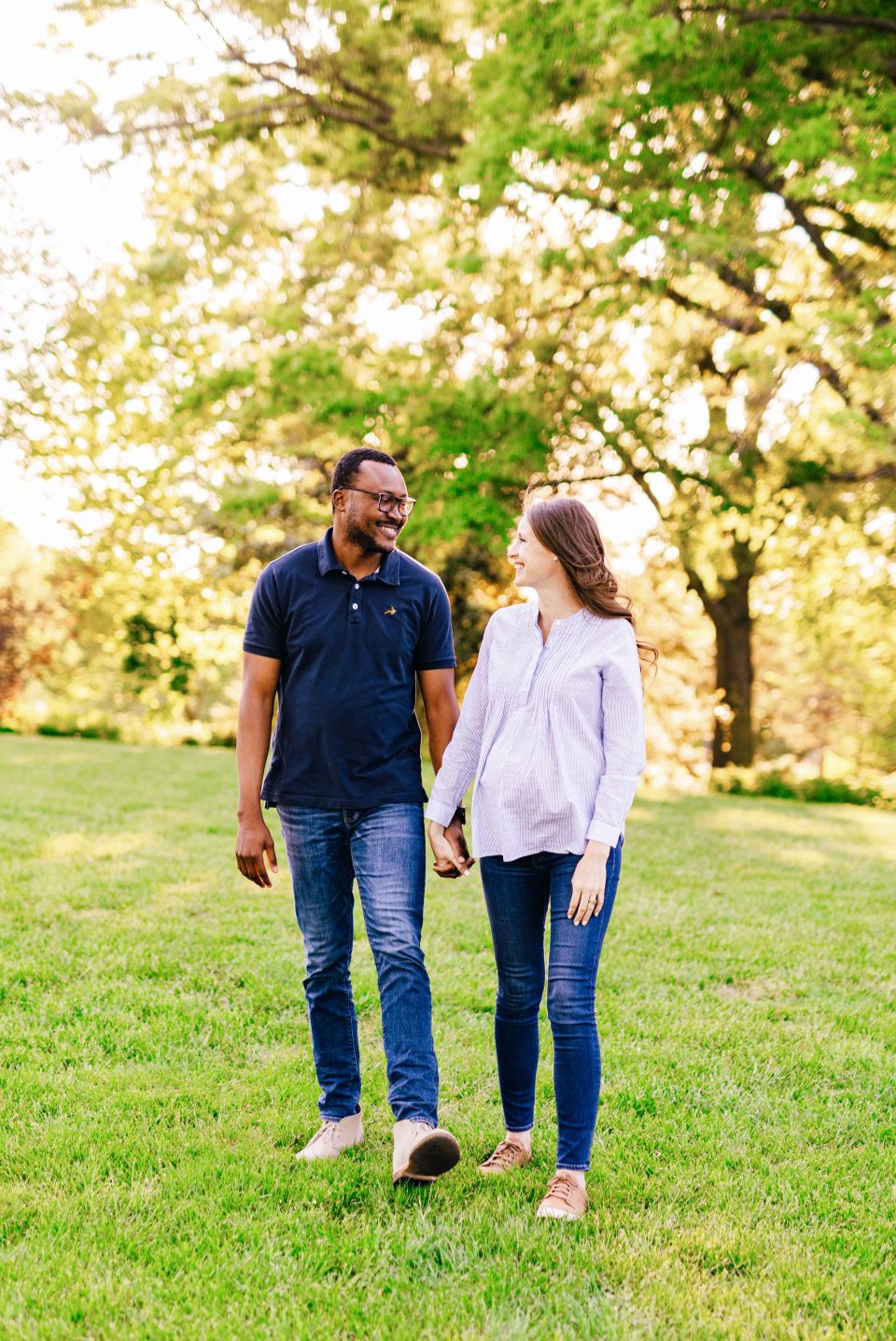Smiling couple walking through gardens at Green Spring Gardens in Alexandria, VA