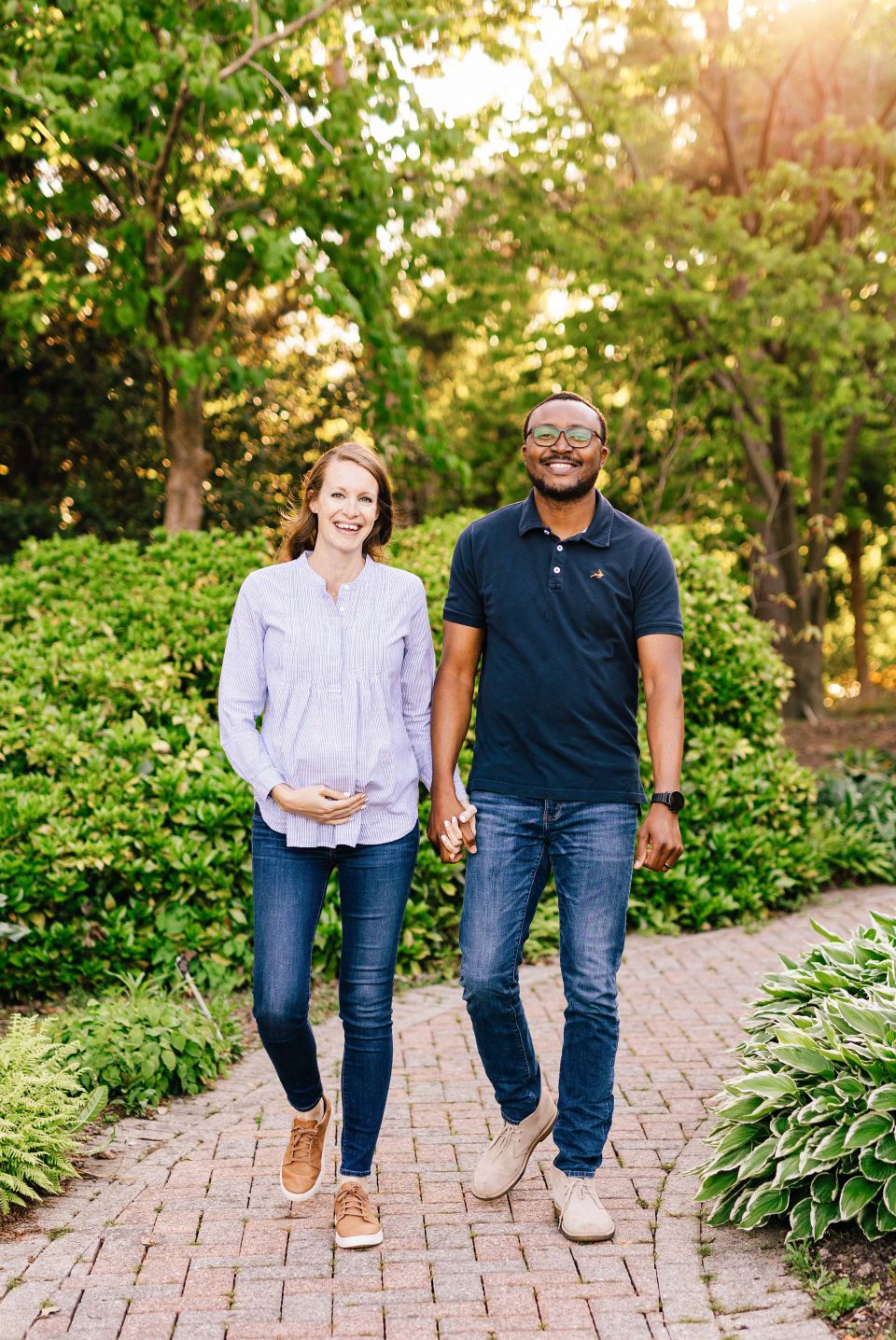 Smiling couple walking through gardens at Green Spring Gardens in Alexandria, VA