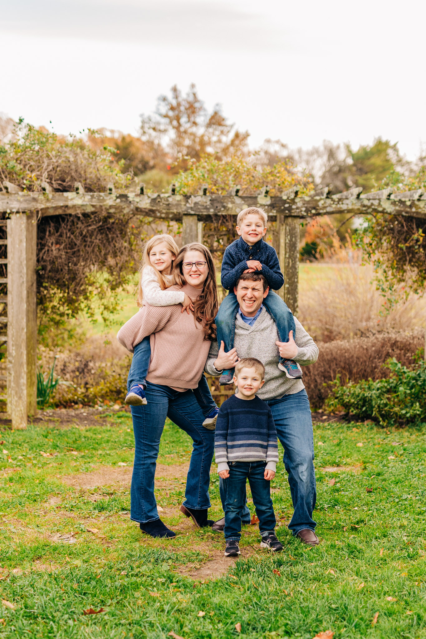 Family posing for photos at Green Spring Gardens in Alexandria, VA